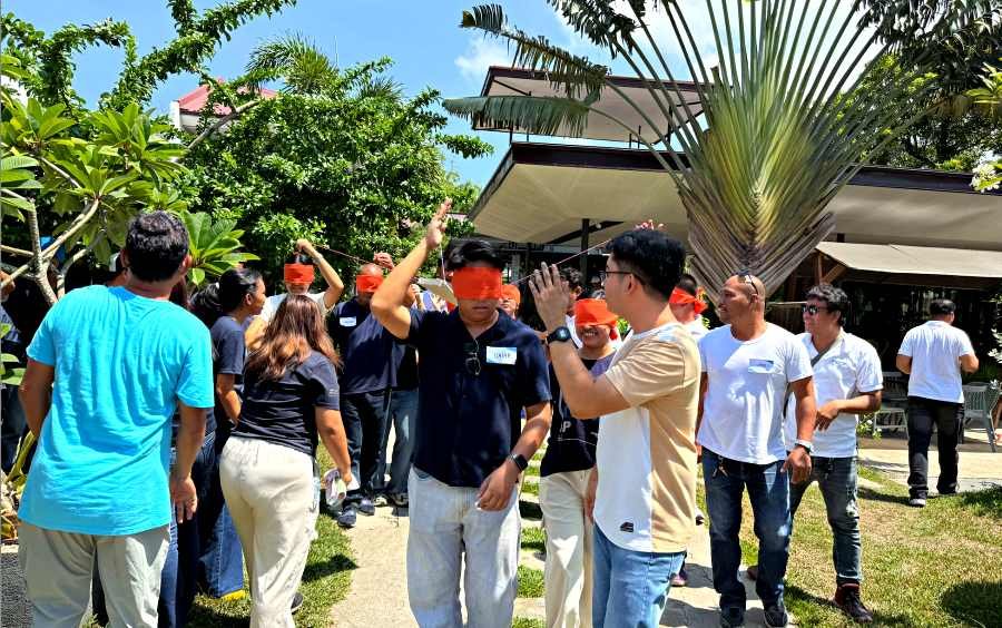 Asian Alcohol Corporation Reconnects Through Teamwork